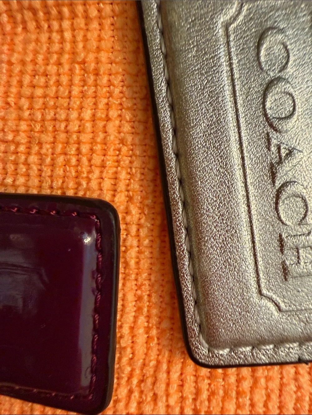 Coach Trio of Leather and Patent Tag Charms with Cream Wristlet